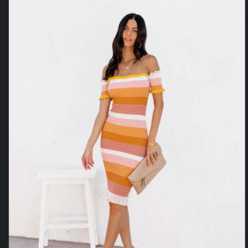 This colorful cotton dress is from Vici and had never been worn